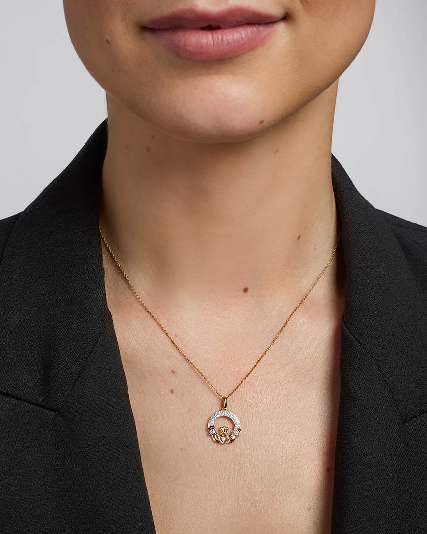 model wearing diamond irish claddagh necklace s45602 
