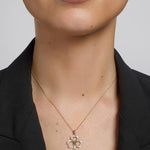 14k gold diamond & emerald shamrock necklace s46104 on a model 1