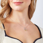 a model wearing Gold And Silver Diamond Claddagh Necklace S46936