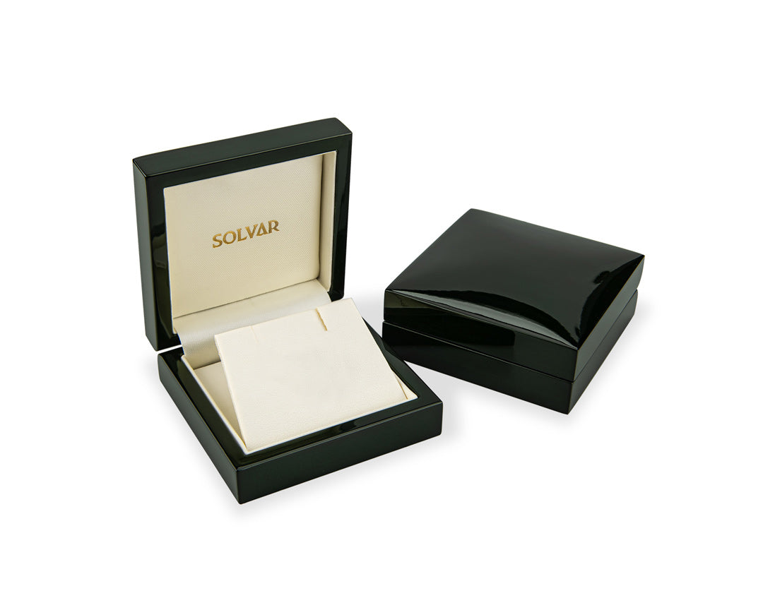 green lacquer luxury wooden box with solvar logo on it