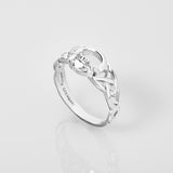 styled image of silver celtic claddagh ring