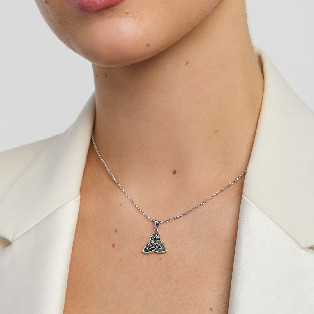 model wearing large Celtic Trinity knot pendant from Solvar