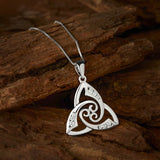 lifestyle image of Celtic cz set Trinity Knot necklace from Solvar