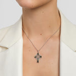 green marble Celtic cross pendant on a model