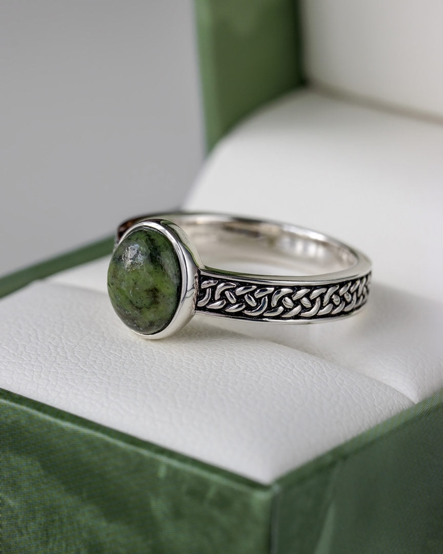 closeup image of connemara marble celtic knot band ring