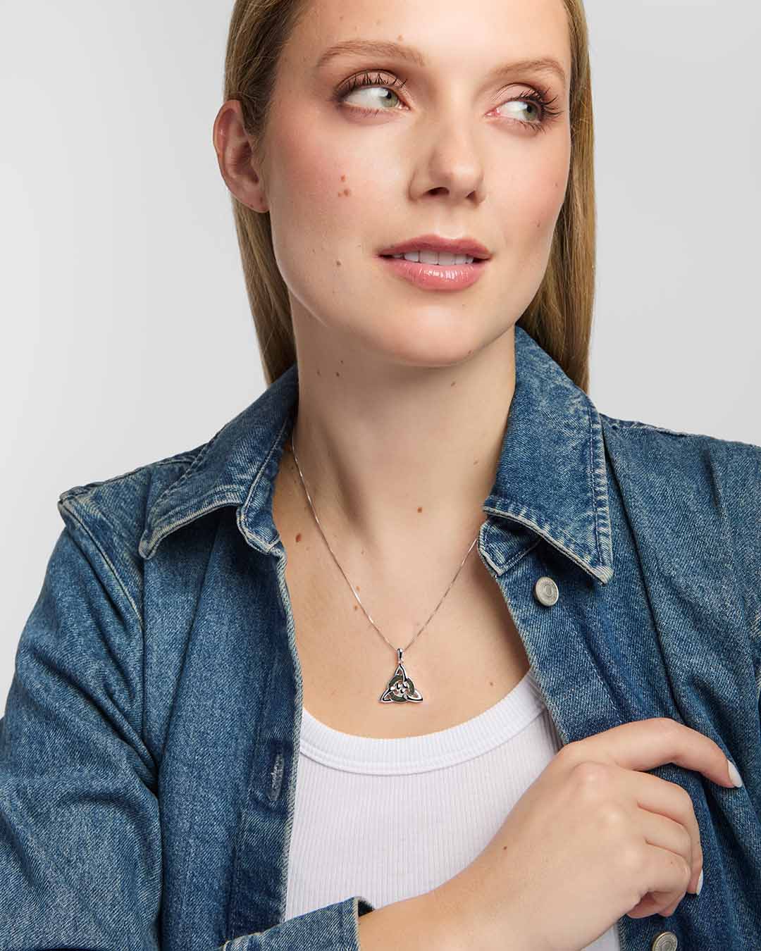 Solvar  silver Celtic Knot pendant entwined around a circular Connemara marble inlay,  presented on a model