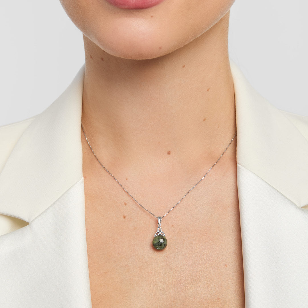 round marble Trinity Knot necklace on a model