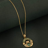 Connemara Marble gold Claddagh necklace on green background