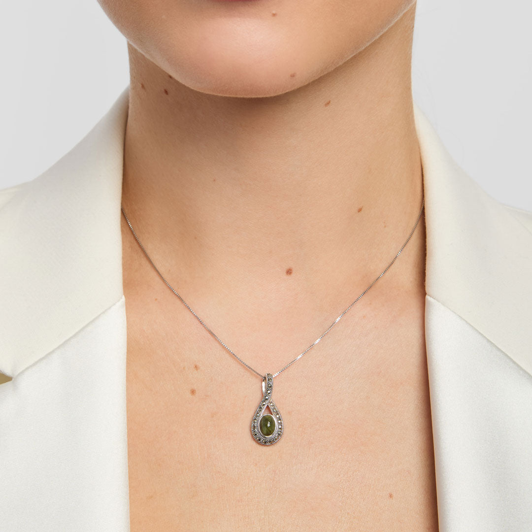 green marble celtic necklace on a model