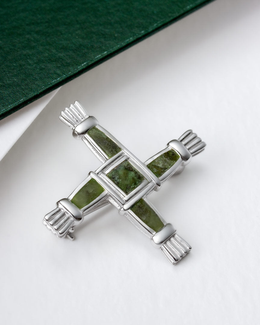 lifestyle image of Connemara marble St Brigid's Cross brooch from Solvar