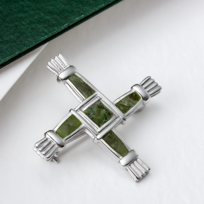 lifestyle image of Connemara marble St Brigid's Cross brooch from Solvar