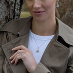 a model wearing Connemara marble Celtic jewellery set