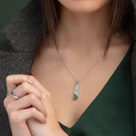 model wearing connemara marble trinity knot necklace s46646 from Solvar