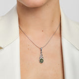 model wearing green marble Celtic knot pendant from Solvar