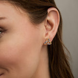 yellow gold Trinity Knot stud earrings on a model