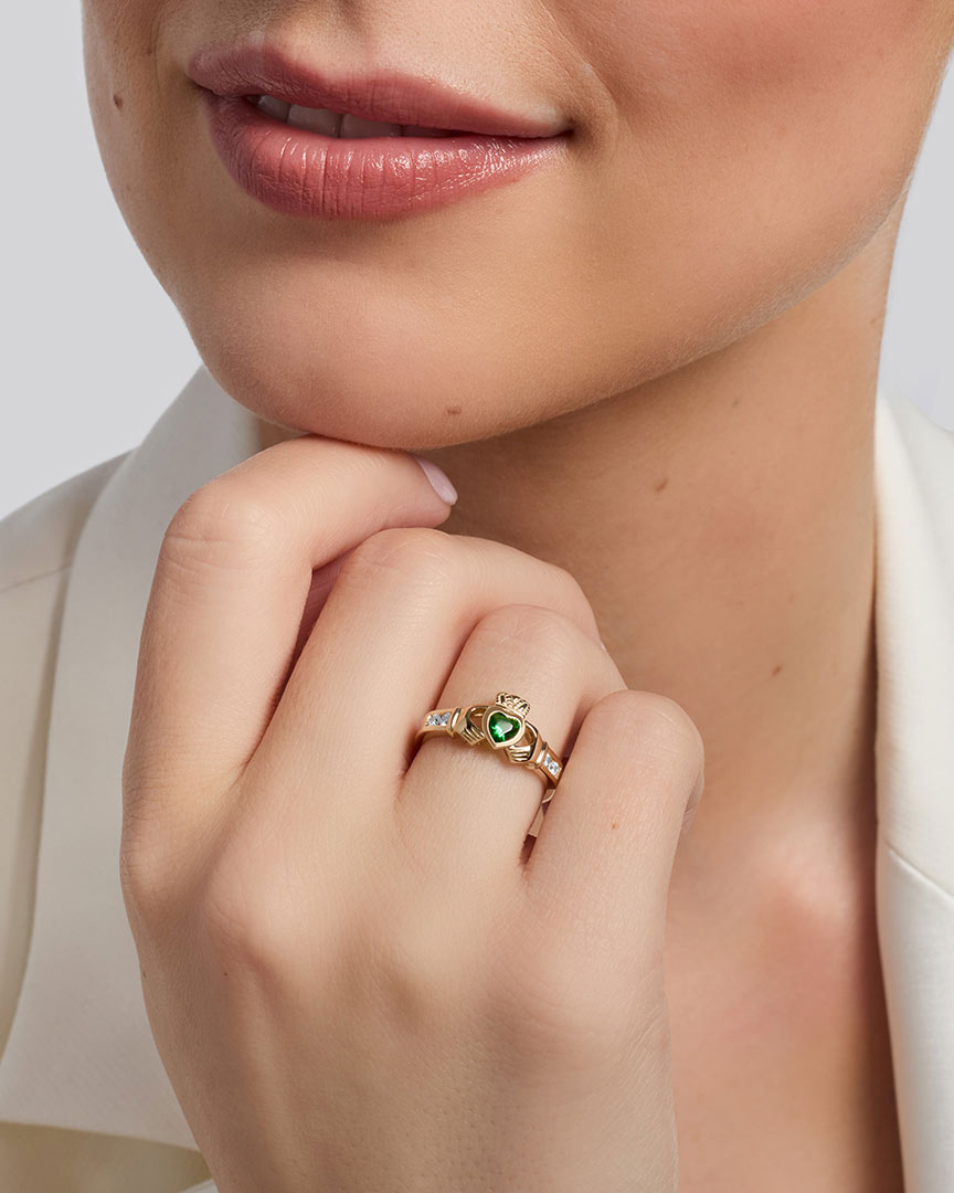 yellow gold Emerald & Cz Claddagh Ring on a model 5