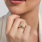 yellow gold Emerald & Cz Claddagh Ring on a model 5