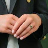 yellow gold Emerald & Cz Claddagh Ring on a model 3