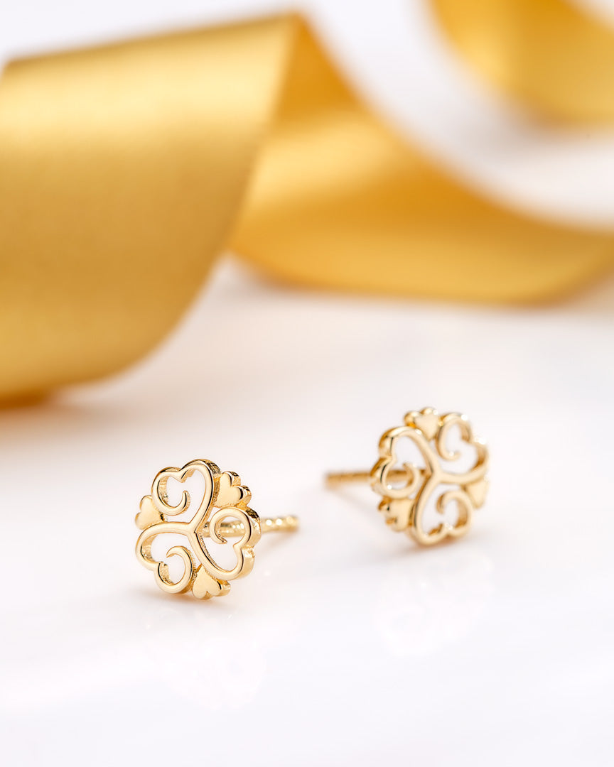 lifestyle image of Solvar fancy shamrock stud earrings