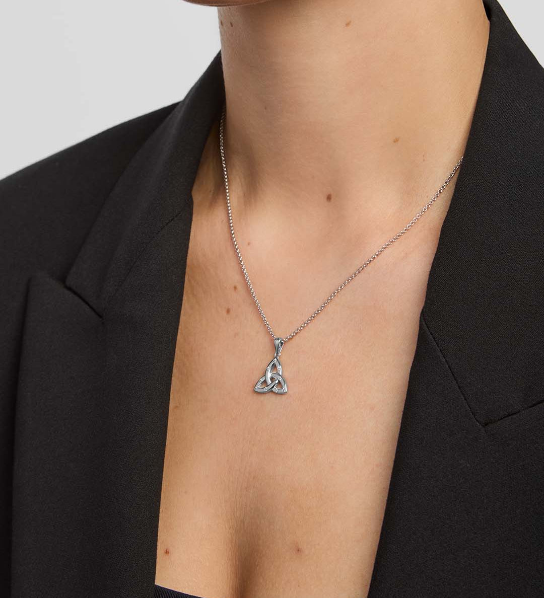 close-up image of large flush set cubic zirconia Trinity Knot pendant from Solvar