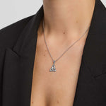 close-up image of large flush set cubic zirconia Trinity Knot pendant from Solvar