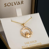 flush set diamond yellow gold Claddagh necklace in Solvar ring box