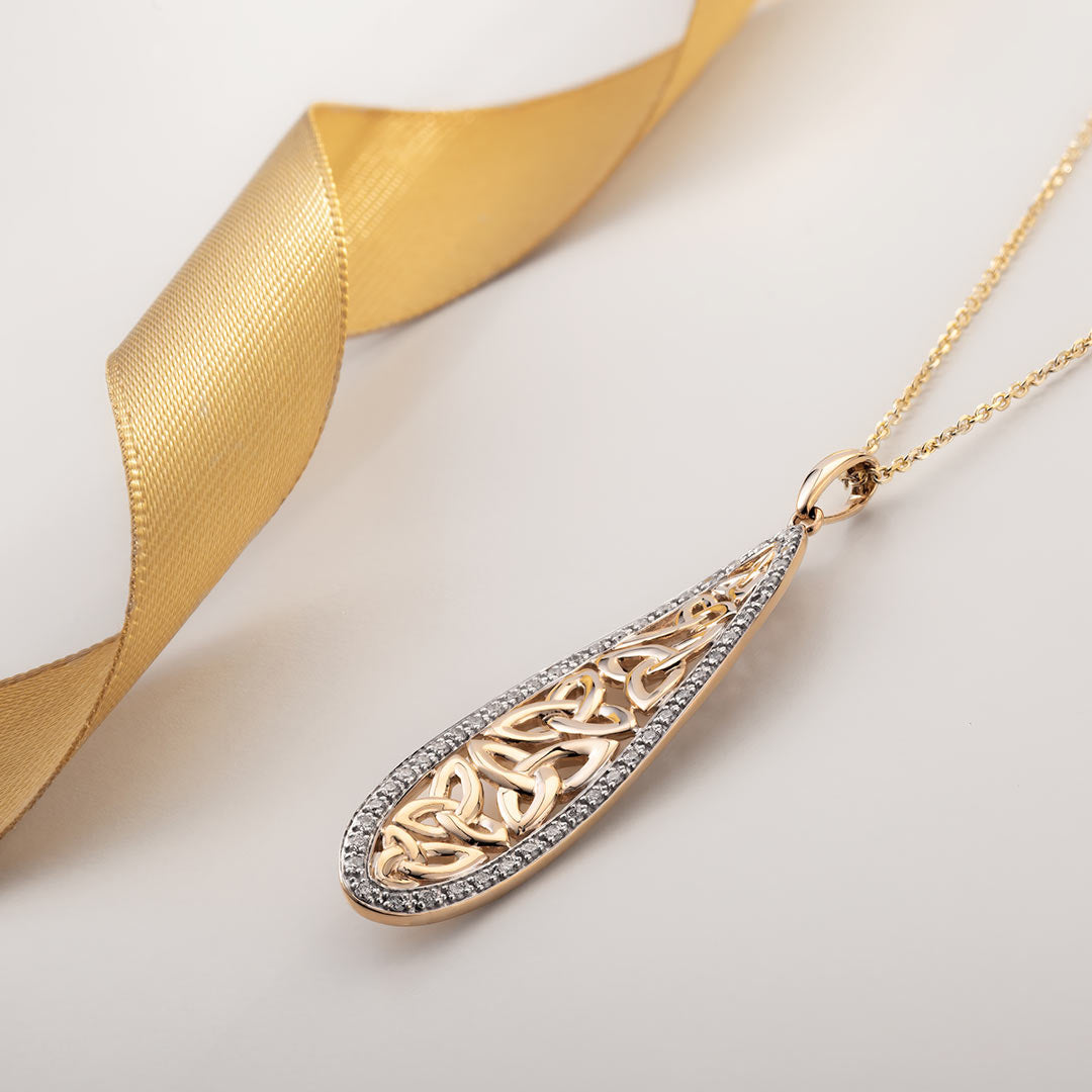 lifestyle image of gold celtic twist necklace