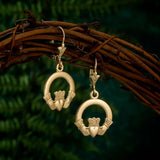 styled image of Solvar gold claddagh drop earrings