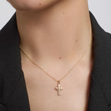 solvar gold small celtic cross pendant on a model