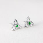 lifestyle image of green crystal silver trinity knot stud earrings s33767 from Solvar