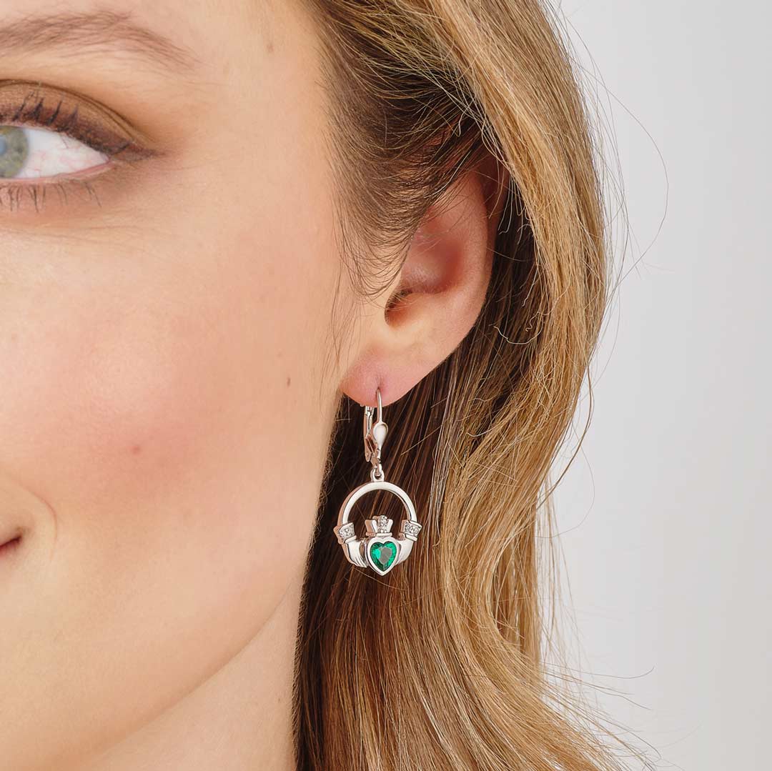 a model wearing Large Green Cz Heart Claddagh Earrings S34175