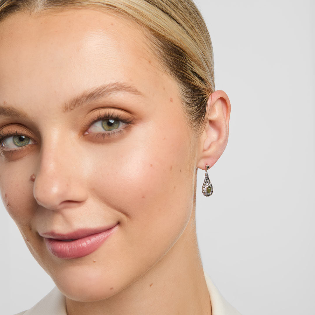 connemara marble celtic earrings on a model