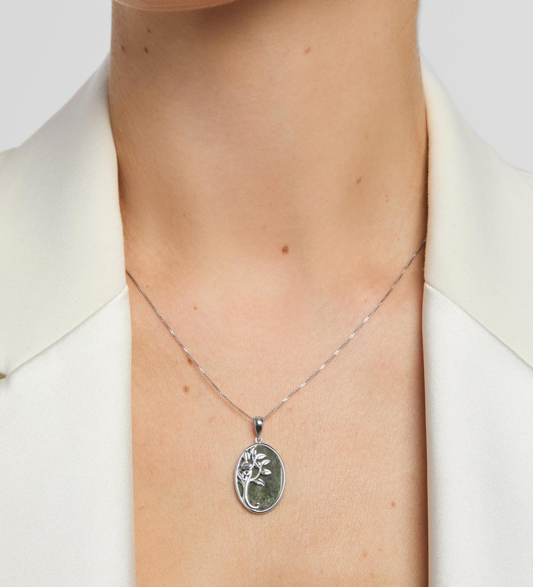 green marble oval Tree of life necklace on a model
