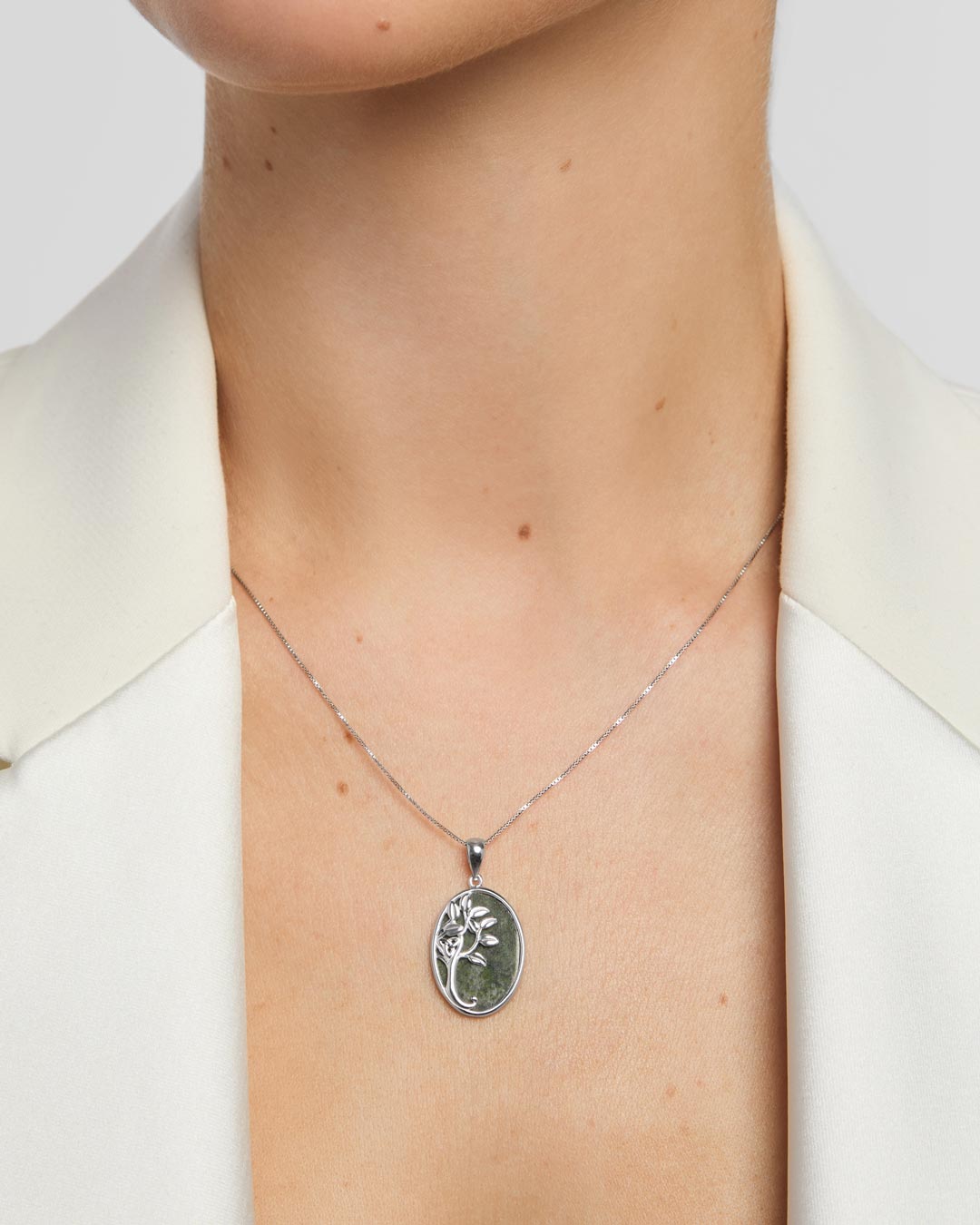 green marble oval Tree of life necklace on a model