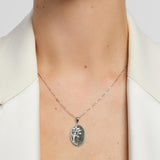 green marble oval Tree of life necklace on a model