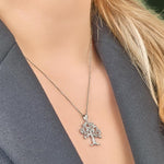 a model wearing Irish Tree of Life necklace in silver