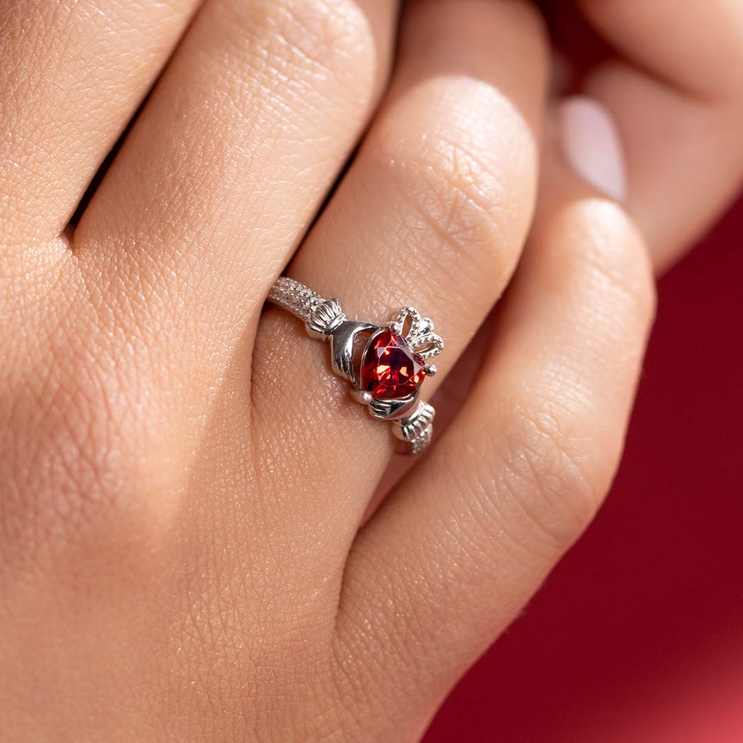 January birthstone garnet claddagh ring 2106201 from Solvar on a model