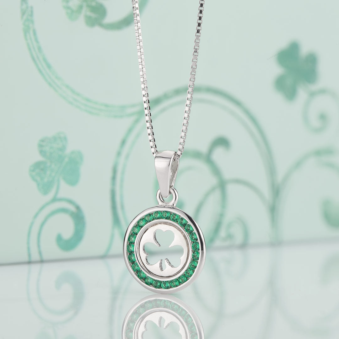 lifestyle image of childrens green cz shamrock pendant