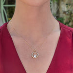 lab diamond claddagh pendant on a model