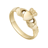 stock image of ladies yellow gold Claddagh ring on the white background 1