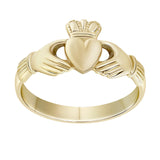 stock image of ladies yellow gold Claddagh ring on the white background 2