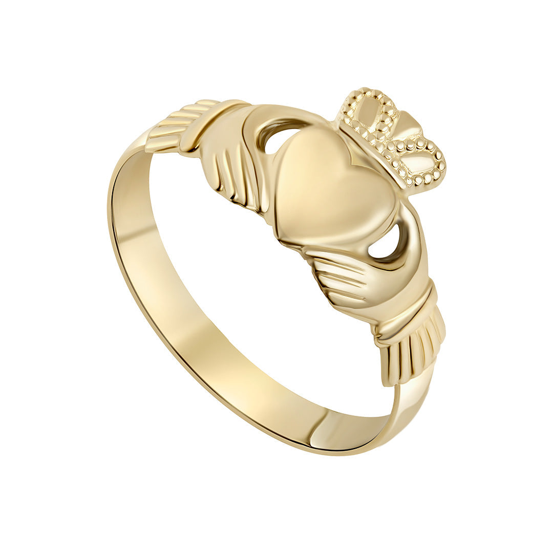 stock image of light weight traditional gold Claddagh ring on the white background 2