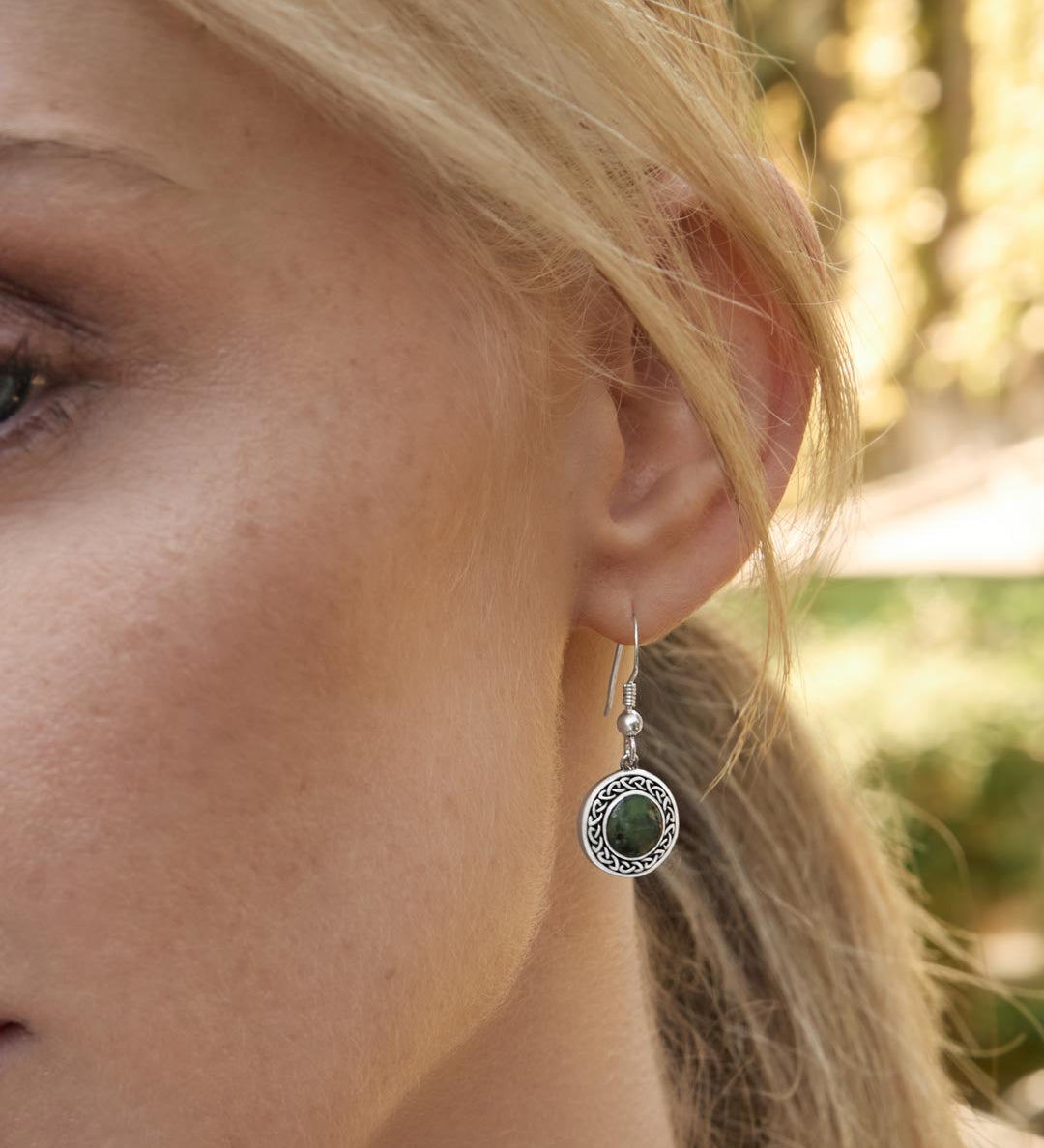 model wearing connemara marble celtic drop earrings from Solvar