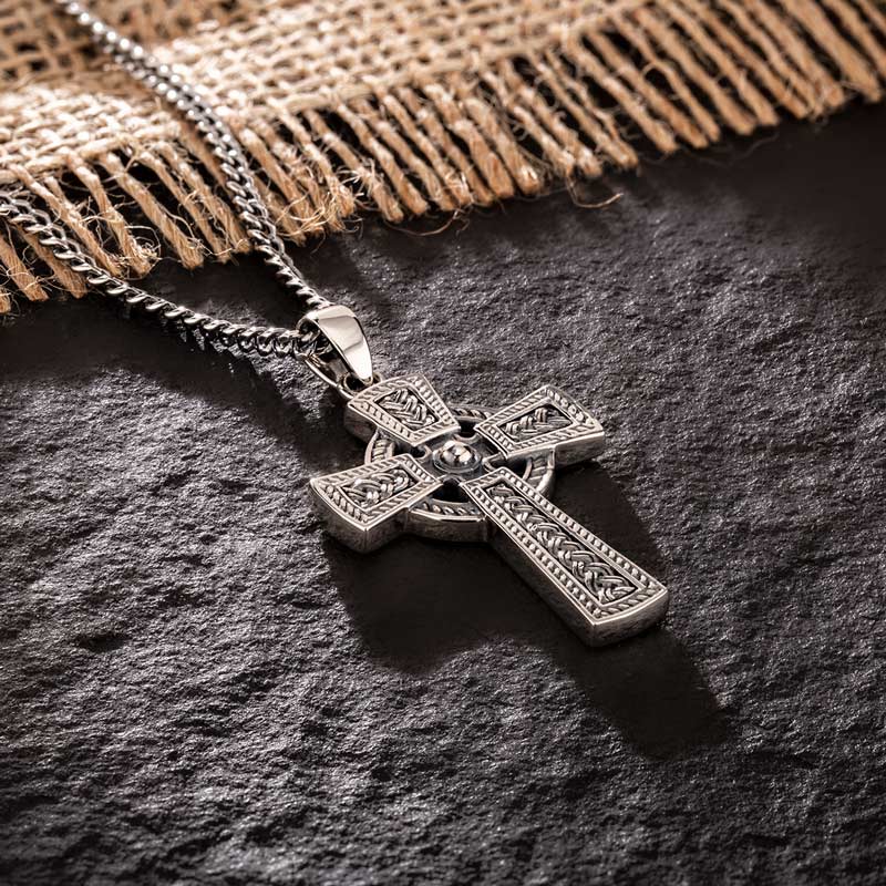 lifestyle image of oxidised silver mens celtic cross pendant s46456