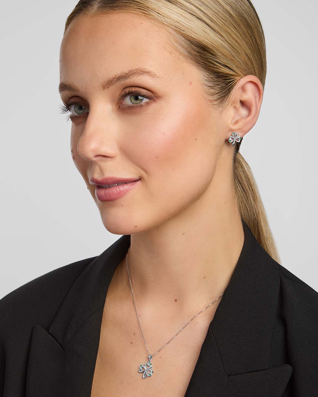 sterling silver shamrock jewellery set on a model