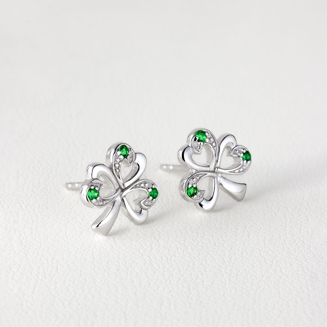 lifestyle image of silver shamrock stud earrings from Solvar