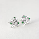 lifestyle image of silver shamrock stud earrings from Solvar