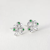 lifestyle image of silver shamrock stud earrings from Solvar