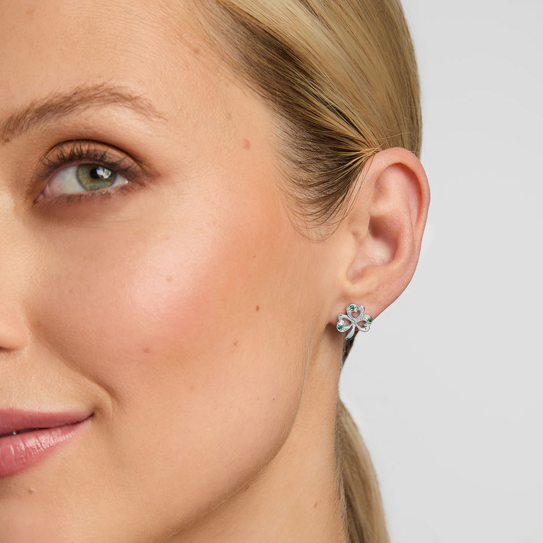 model wearing silver Shamrock stud earrings from Solvar