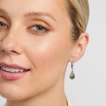 model weating silver Marble & Marcasite Trinity Drop Earrings from Solvar